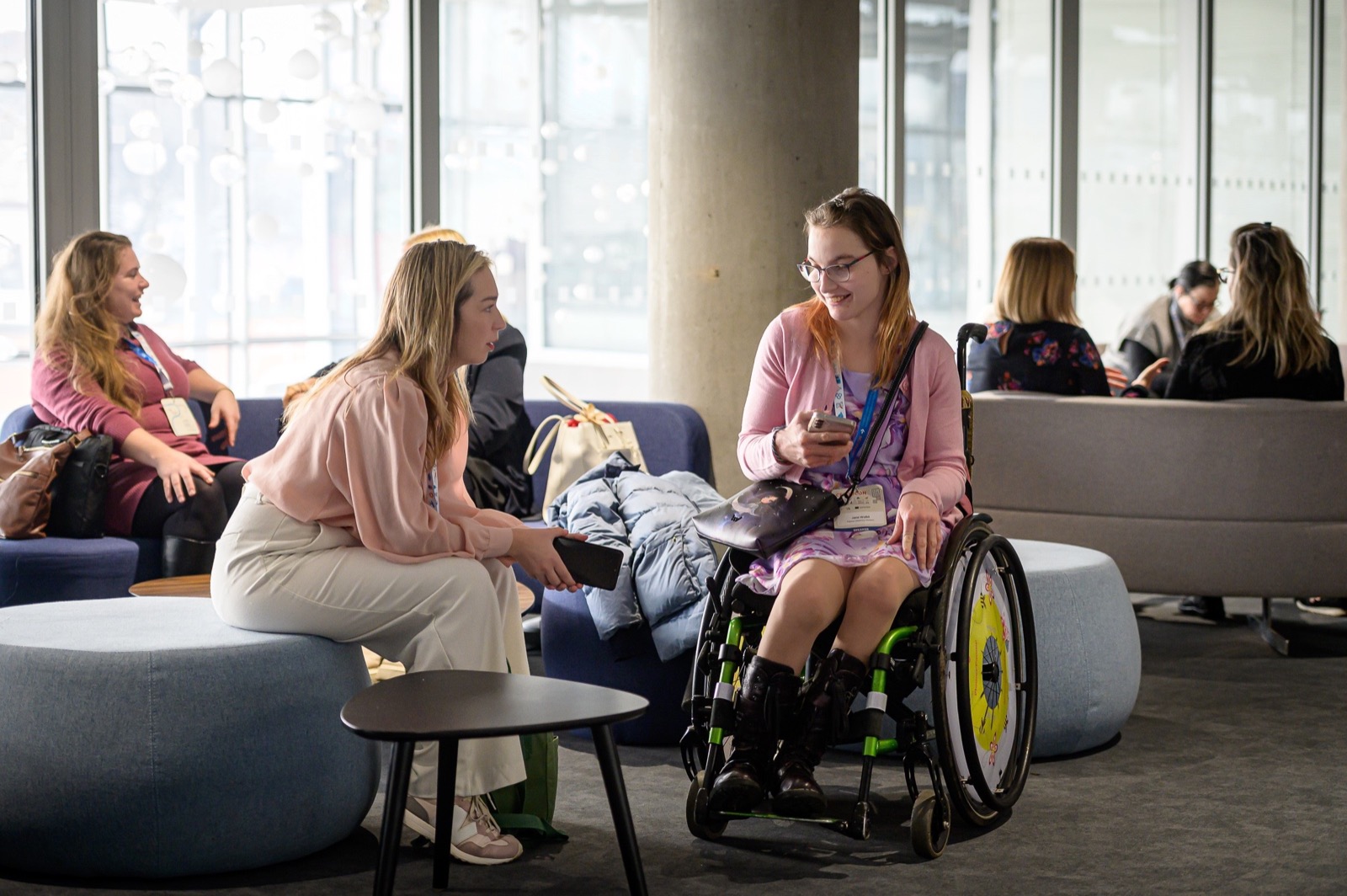 CEEDUCON participants speaking in an accessible lounge area